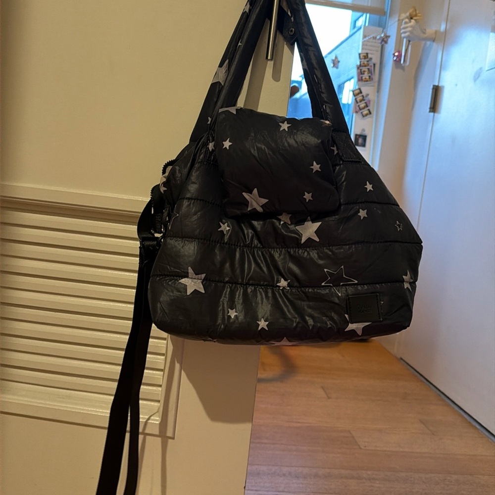 7am Enfant Voyage bag with black stars